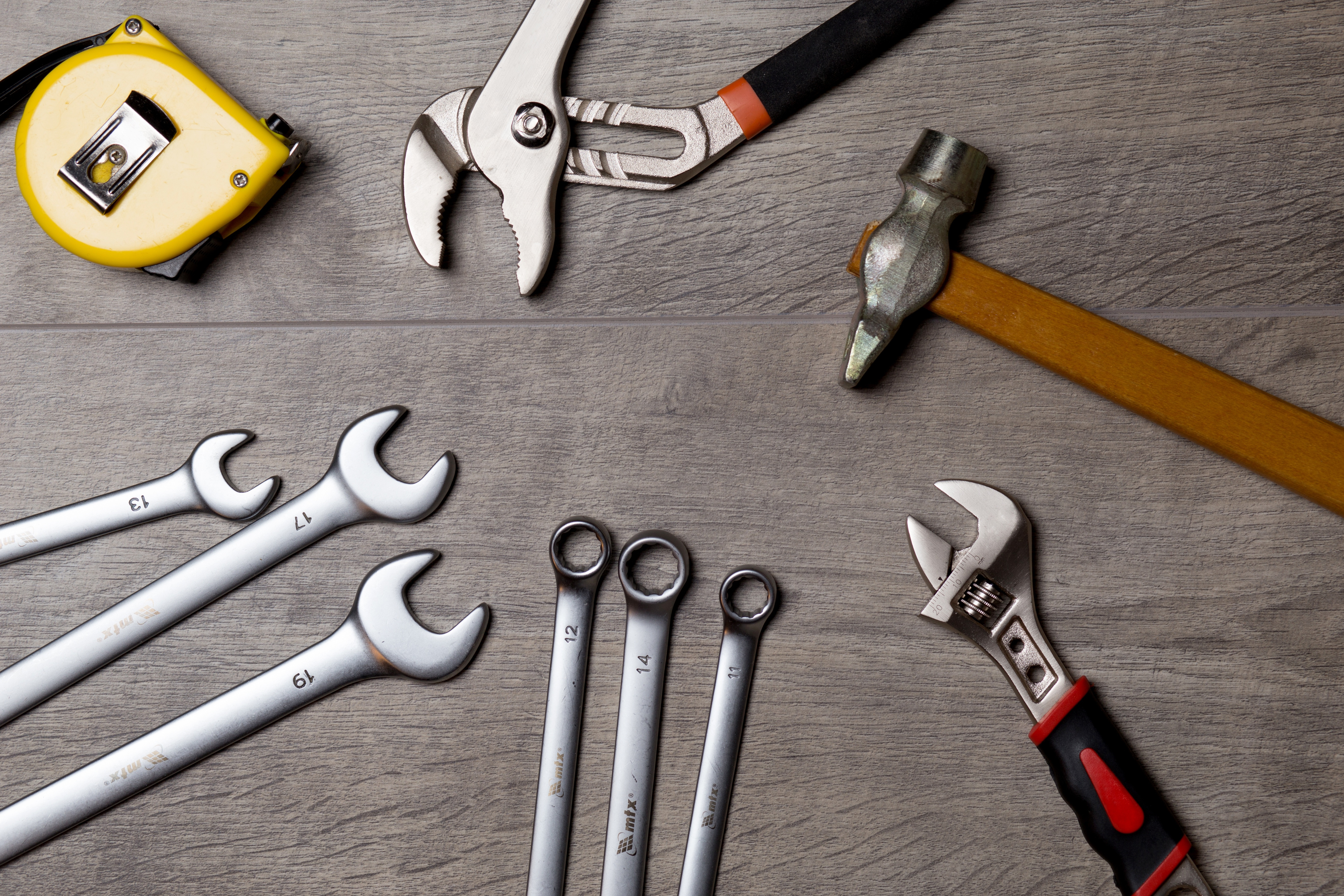 Top view of Repair Tools on Wooden Background